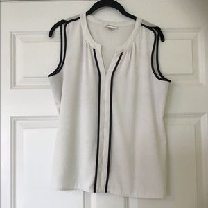 White and black sleeveless blouse